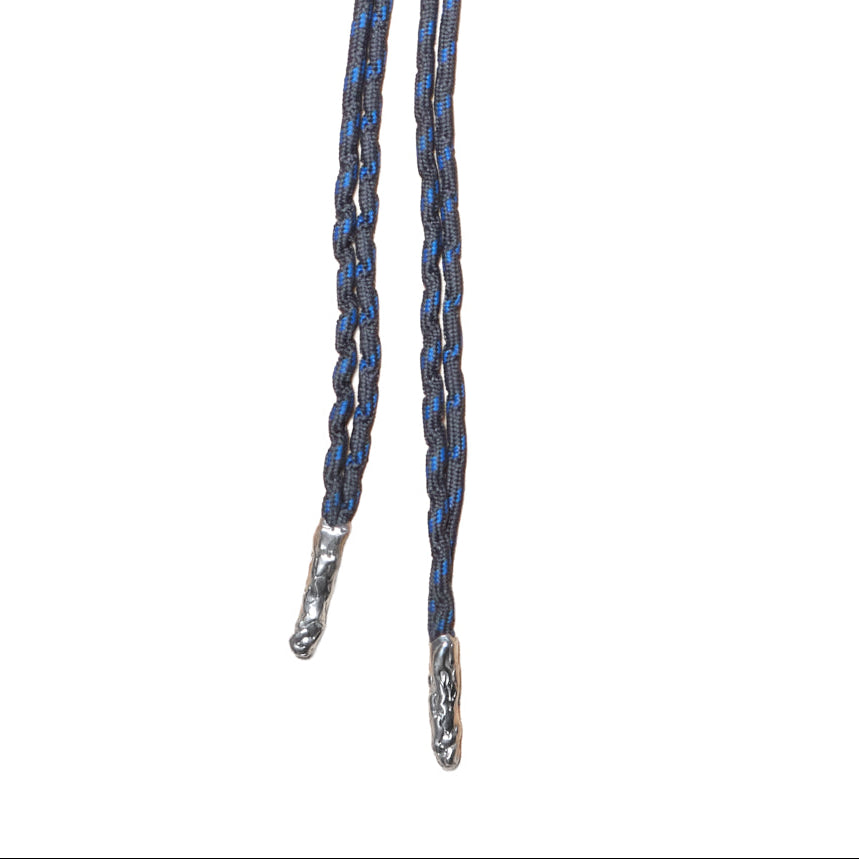 Le Geste Bolo Tie — Silver, sculptural bolo tie on a double cord