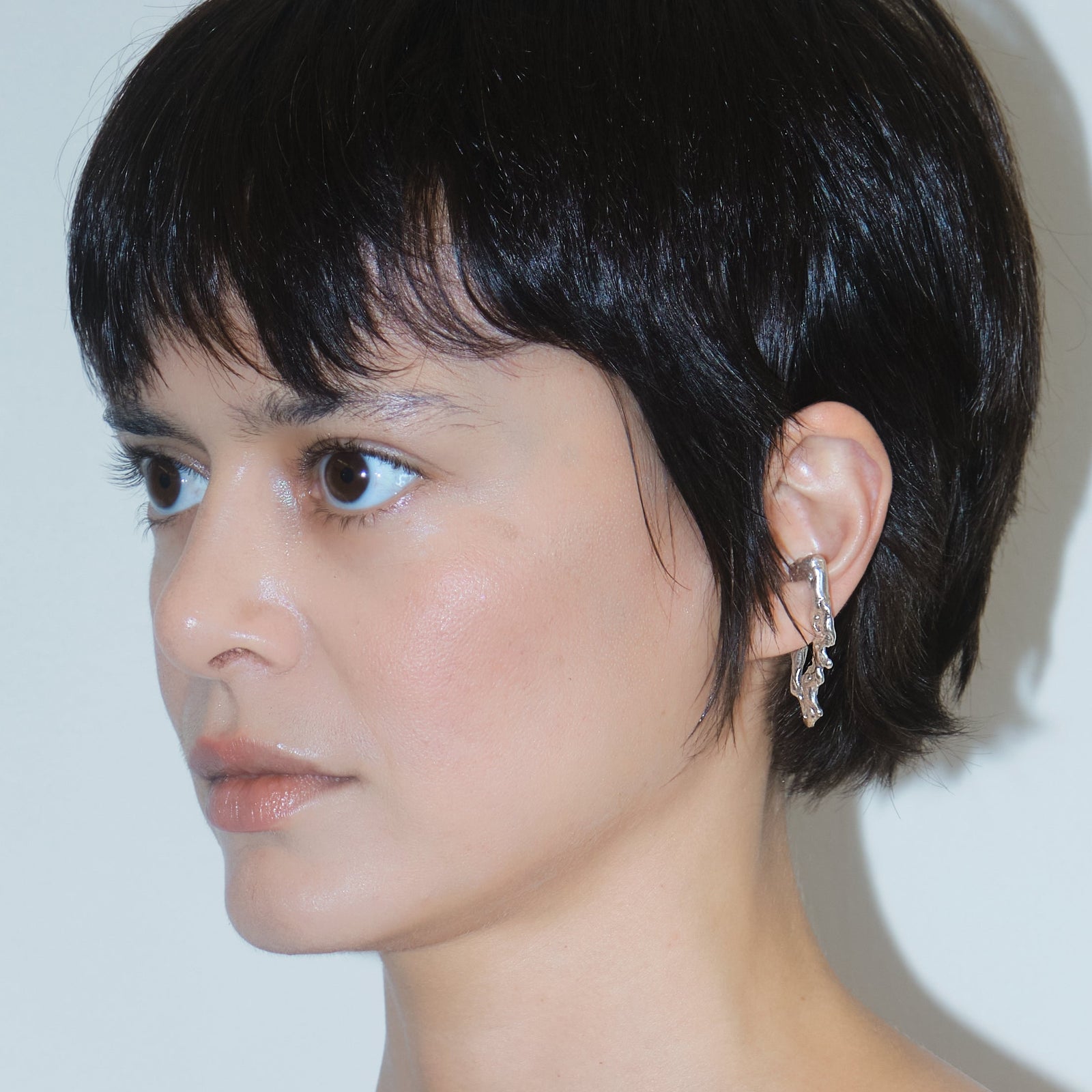 Curl Cuff — Silver, worn on ear